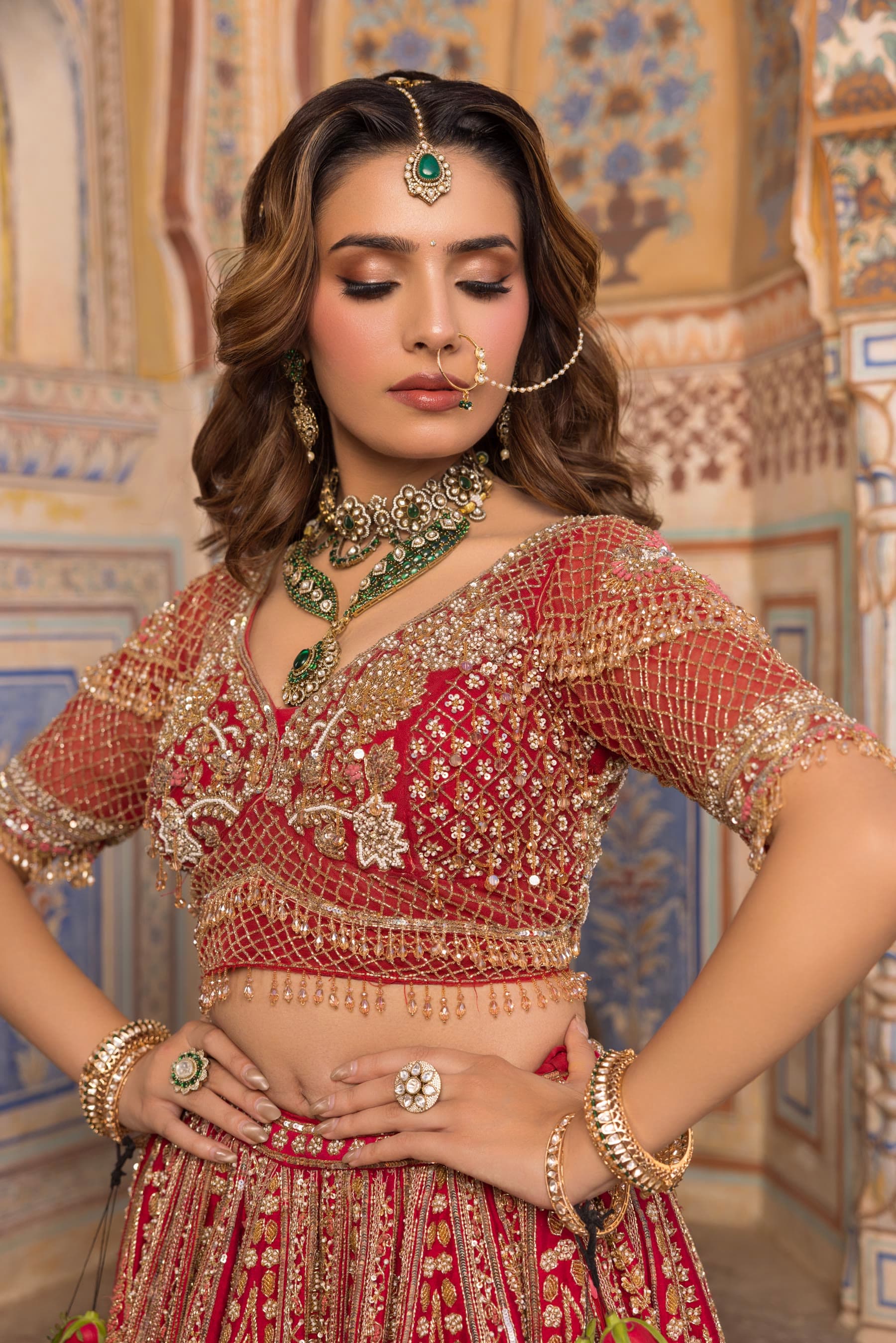 A bride with one hand at her waist