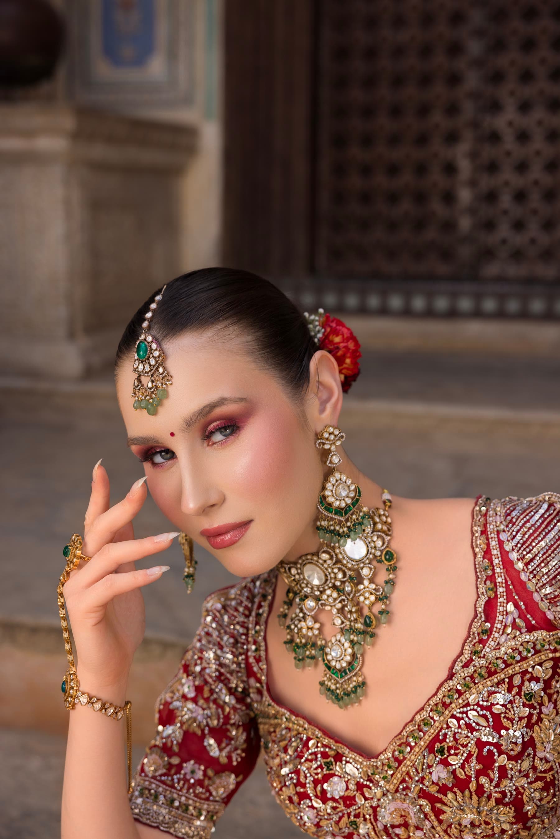 A bride resting a hand below her jaw